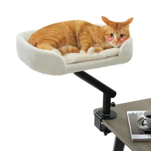 Cat desk bed with 360° rotation on a home desk — adjustable hammock-style basket and soft sleeping surface