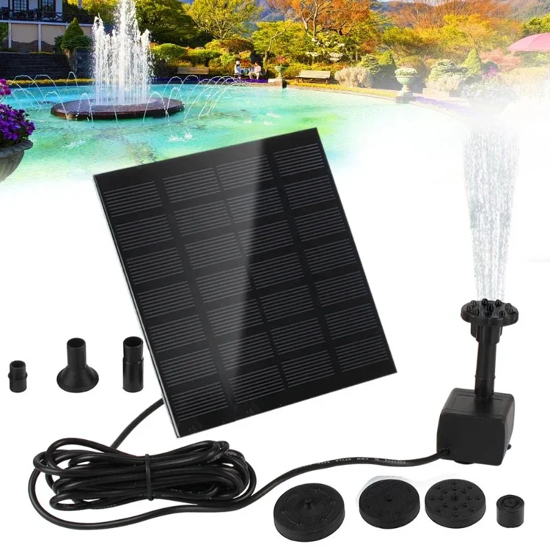 Mini 1.2W solar fountain pump and solar panel set up in a small garden fountain