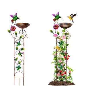 Vintage metal bird bath with removable iron basin in garden setting