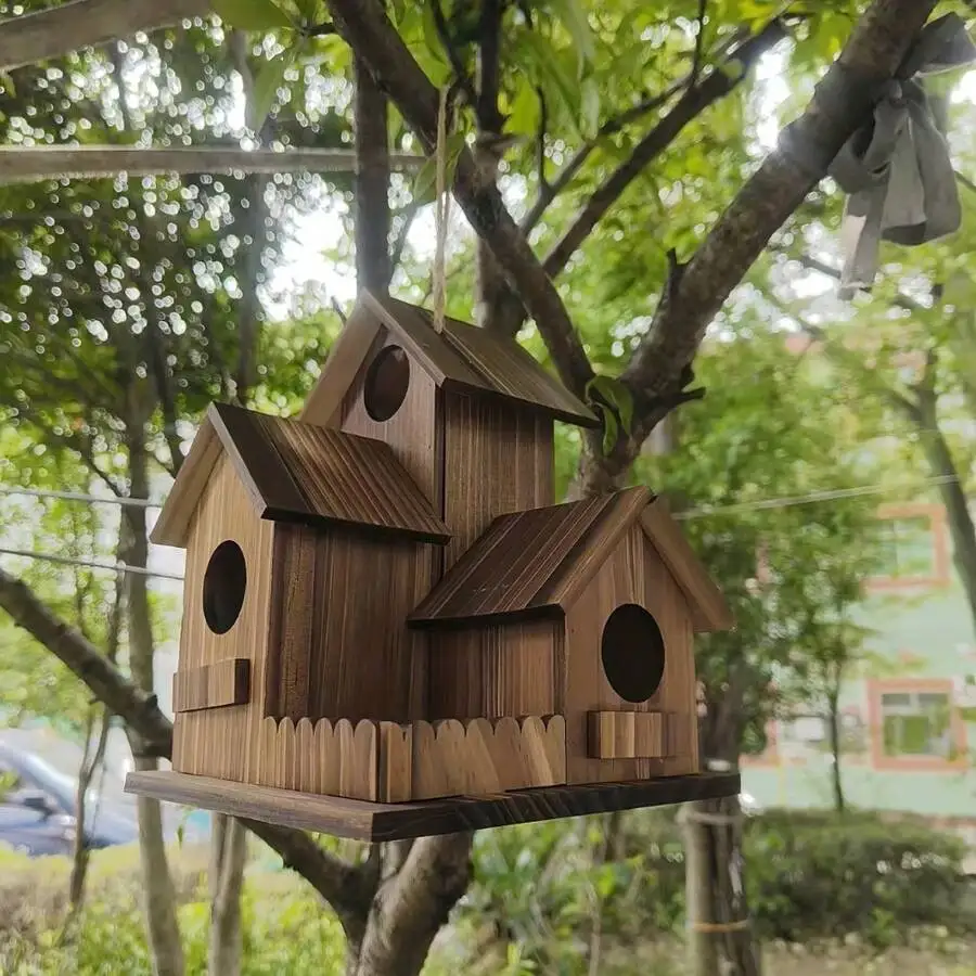 Three‑Chamber Wooden Hanging Bird House with clear wood grain, showing three entrances and hanging loop – view 4